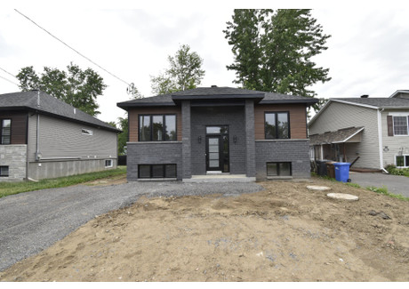 Dom na sprzedaż - 265 48e Avenue, Pointe-Calumet, QC J0N1G0, CA Pointe-Calumet, Kanada, 102 m², 288 206 USD (1 196 055 PLN), NET-103244710